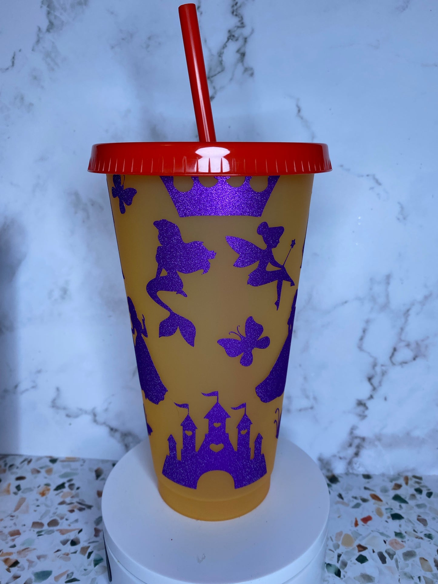 24 ounce color changing Disney tumbler.