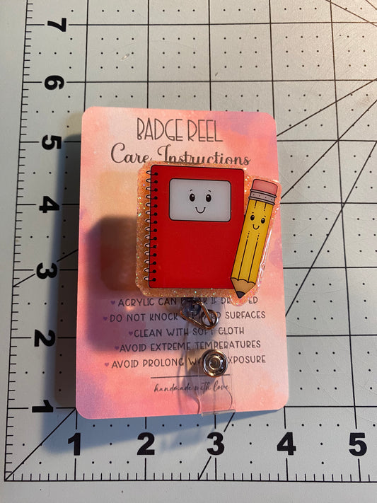 Book and Pencil Badge Reel